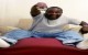 2106059-un-homme-african-american-enthousiastes-a-l-39-idee-de-regarder-la-tv-copie-espace-compris-300x225 (1)
